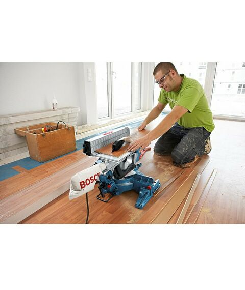 Электропилы: Торцовочная пила BOSCH GTM 12 JL 1800 Вт, 4300  об/мин, размер диска 305х30 мм, размер.раб.стола 465х308 мм, макс.ширина/макс.высота в гр. 151/95, высота заготовки в режиме настольной дисковой пилы 51 мм [0601B15001] фотографии