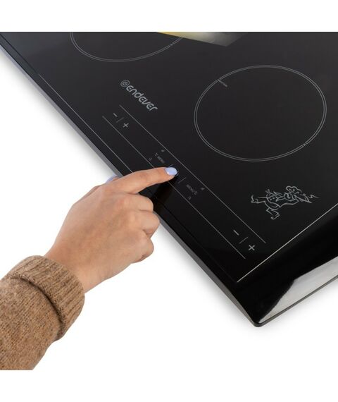 Электроплитки: Плитка индукционная Endever IP-54 двухконфорочная, мощность 1600+1300 Вт, 10 уровней регулировки температуры и мощности фотографии