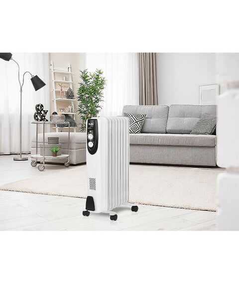 Масляные радиаторы: Масляный радиатор Ballu Classic BOH/CL-09WRN мощность обогрева 2000 Вт, число секций: 9, термостат, колеса для перемещения, цвет белый фотографии