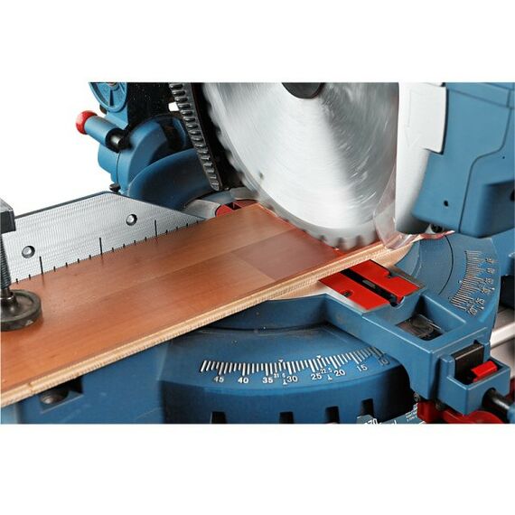 Электропилы: Торцовочная пила BOSCH GTM 12 JL 1800 Вт, 4300  об/мин, размер диска 305х30 мм, размер.раб.стола 465х308 мм, макс.ширина/макс.высота в гр. 151/95, высота заготовки в режиме настольной дисковой пилы 51 мм [0601B15001] фотографии