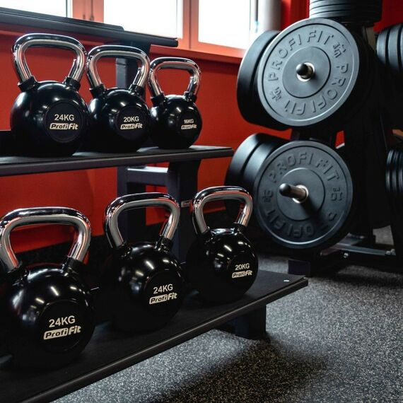 Диски d 50:  Диск для штанги каучуковый, черный D51 мм PROFI-FIT 15 кг фотографии